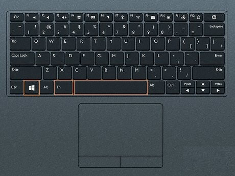 Fn key + Windows key + Space Bar